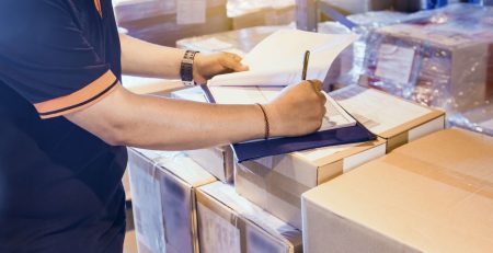 Export and freight documentation being completed by employee